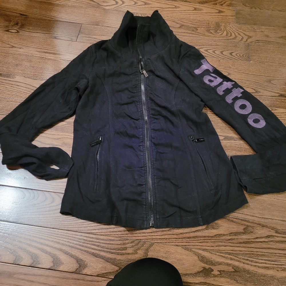 TATTOO Zip up, writing on sleeve, in Excellent condition.